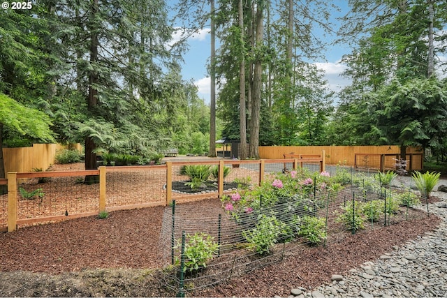28831 SE Woods Rd, Eagle Creek, OR 97022 - fenced yard featuring a garden