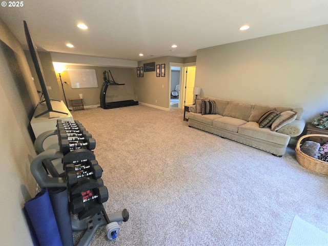 living area featuring recessed lighting and light carpet