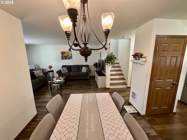 3125 NE Flintlock Pl, Corvallis, OR 97330 - dining area featuring wood finished floors, stairway, and a chandelier