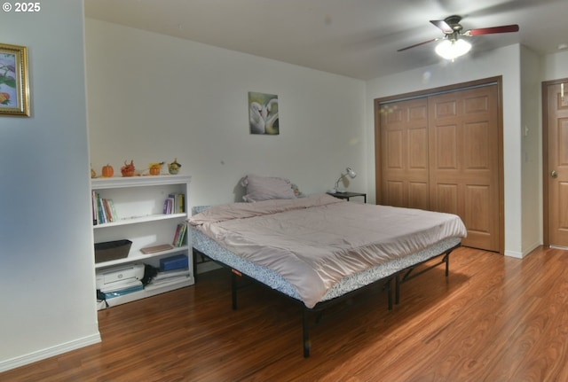 3125 NE Flintlock Pl, Corvallis, OR 97330 - bedroom with wood finished floors, a closet, and baseboards