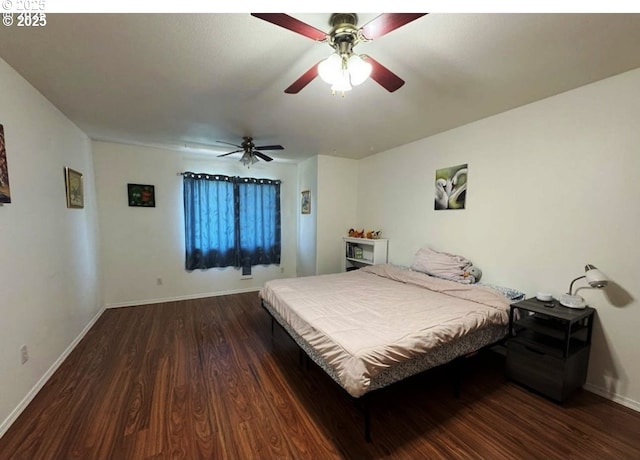 3125 NE Flintlock Pl, Corvallis, OR 97330 - bedroom featuring dark wood-style flooring, baseboards, and a ceiling fan