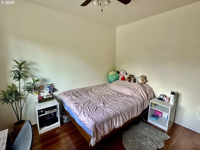 3125 NE Flintlock Pl, Corvallis, OR 97330 - bedroom featuring wood finished floors, ceiling fan, and baseboards