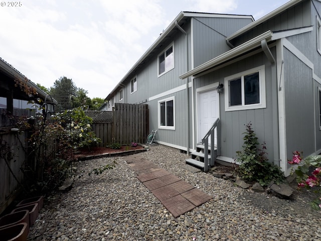 3125 NE Flintlock Pl, Corvallis, OR 97330 - rear view of property featuring entry steps and fence