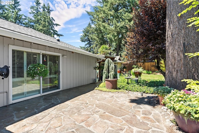 view of patio featuring fence