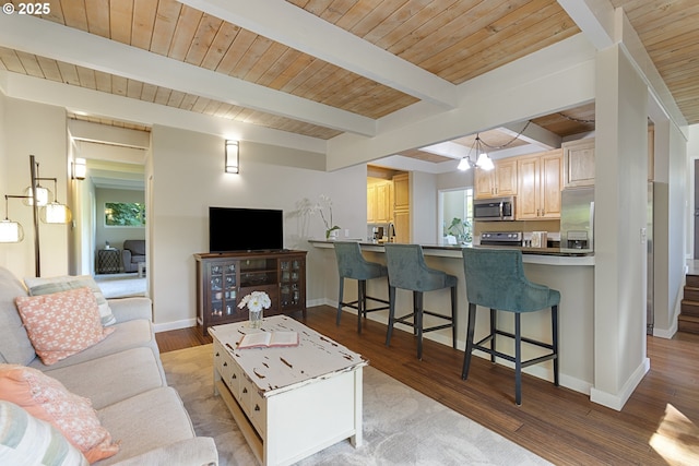 28825 SW Grahams Ferry Rd, Wilsonville, OR 97070 - living room featuring wood finished floors and a wooden ceiling with exposed beams