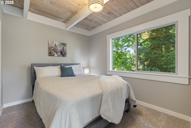 28825 SW Grahams Ferry Rd, Wilsonville, OR 97070 - carpeted bedroom featuring a wood ceiling with exposed beams and baseboards