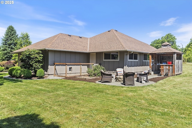 28825 SW Grahams Ferry Rd, Wilsonville, OR 97070 - rear view of property featuring board and batten siding, a gazebo, a patio, a shingled roof, and a yard
