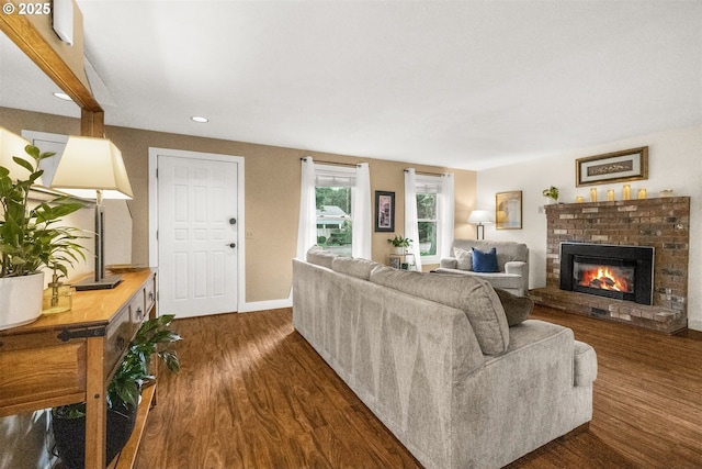 6516 SW Locust St, Portland, OR 97223 - living room featuring dark wood finished floors, a brick fireplace, and recessed lighting