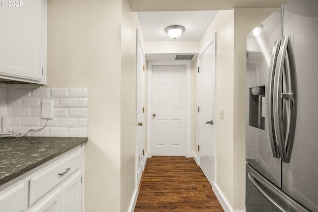 6516 SW Locust St, Portland, OR 97223 - corridor with dark wood-type flooring and baseboards