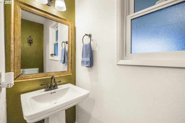 6516 SW Locust St, Portland, OR 97223 - half bath with a sink and toilet
