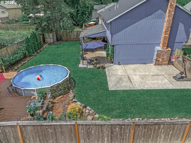6516 SW Locust St, Portland, OR 97223 - fenced backyard featuring a patio