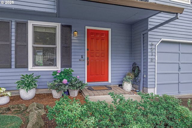 6516 SW Locust St, Portland, OR 97223 - doorway to property featuring a garage