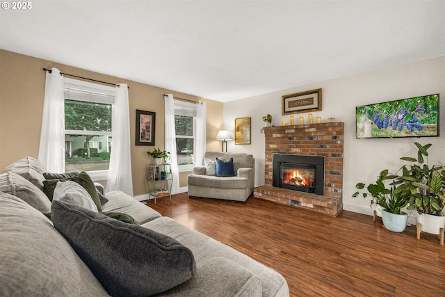 6516 SW Locust St, Portland, OR 97223 - living room with a brick fireplace and wood finished floors