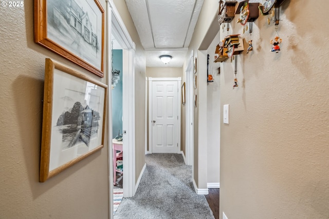 623 10th Ave, Albany, OR 97321 - corridor featuring carpet flooring, attic access, and a textured wall