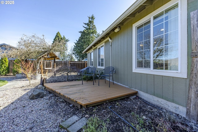 deck featuring a fenced backyard