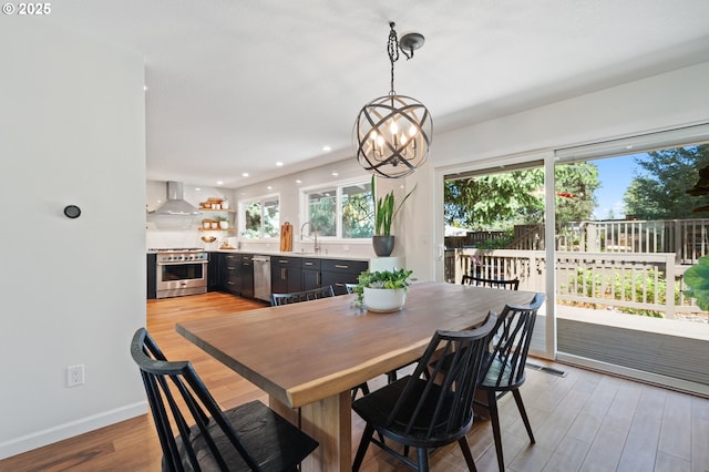 1437 Greentree Cir, Lake Oswego, OR 97034 - dining room featuring a chandelier, recessed lighting, light wood-style floors, and baseboards