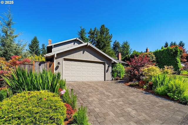 1437 Greentree Cir, Lake Oswego, OR 97034 - view of front facade with a chimney, an attached garage, and driveway