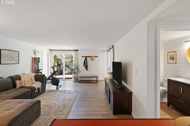 1437 Greentree Cir, Lake Oswego, OR 97034 - living room featuring light wood-style floors and a textured ceiling