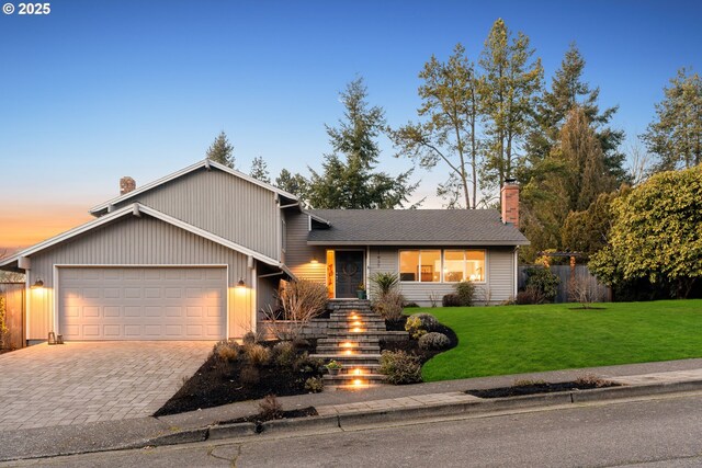 1437 Greentree Cir, Lake Oswego, OR 97034 - view of front facade featuring a chimney, a garage, and driveway