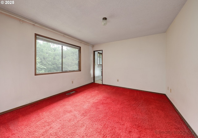 6902 SW 2nd Ave, Portland, OR 97219 - carpeted spare room featuring a textured ceiling