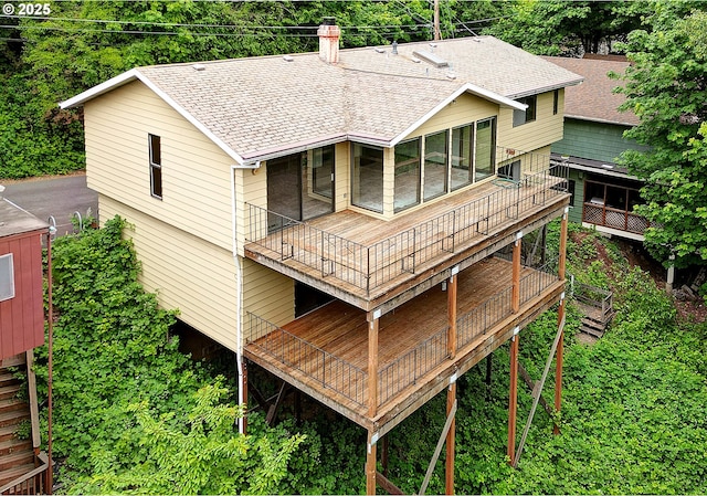 6902 SW 2nd Ave, Portland, OR 97219 - rear view of property with roof with shingles, a chimney, and a deck