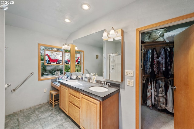 bathroom with vanity and an enclosed shower