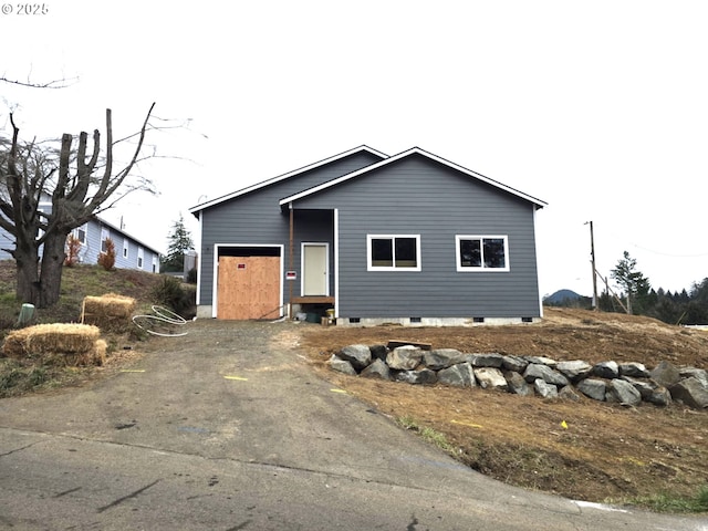 view of front of home with a garage