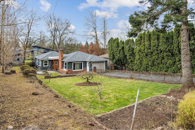 view of yard featuring a garage