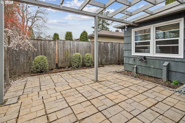 view of patio featuring a fenced backyard and a pergola