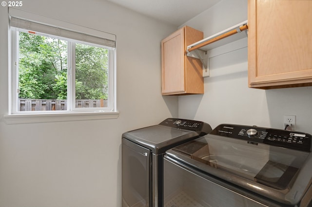 11069 SW Eschman Way, Tigard, OR 97223 - washroom with cabinet space and washing machine and dryer