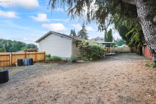 2335 5th St, Columbia City, OR 97018 - rear view of property with a fenced backyard