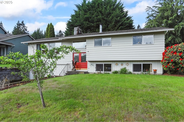 2335 5th St, Columbia City, OR 97018 - view of front of house with a front lawn, entry steps, and a chimney