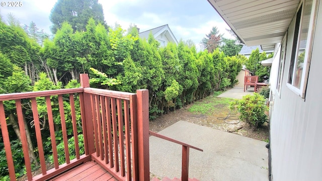 437 SE 154th Ave, Portland, OR 97233 - wooden deck with a patio area