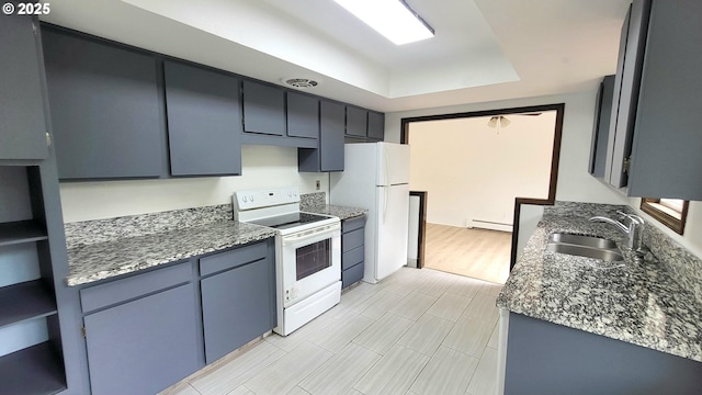 437 SE 154th Ave, Portland, OR 97233 - kitchen featuring white appliances, baseboard heating, a sink, and a raised ceiling