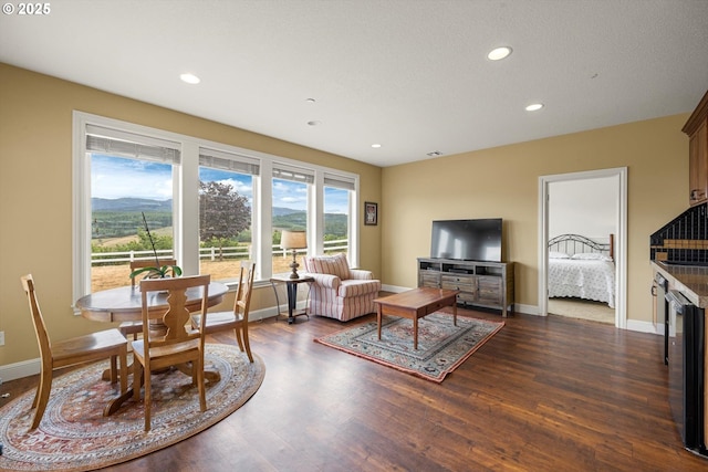 14040 NW Parson Rd, Forest Grove, OR 97116 - living area featuring dark wood-style flooring, recessed lighting, and wine cooler