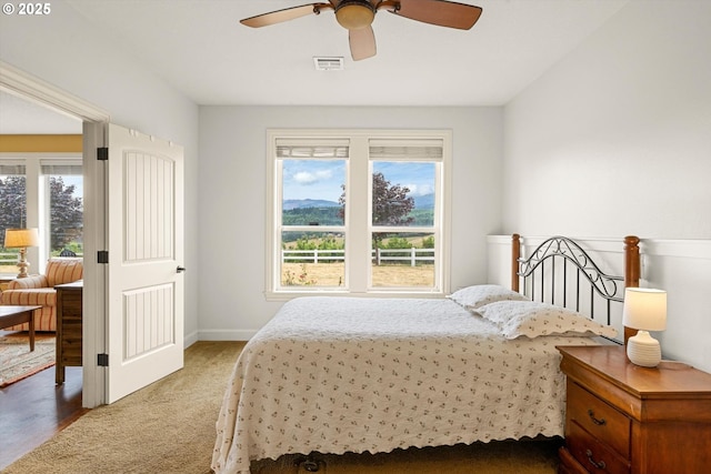 14040 NW Parson Rd, Forest Grove, OR 97116 - bedroom featuring multiple windows, carpet floors, and a ceiling fan