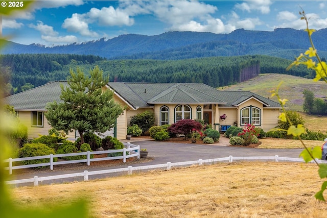 14040 NW Parson Rd, Forest Grove, OR 97116 - view of front of house with a mountain view, a forest view, and asphalt driveway