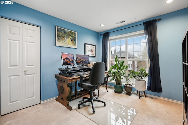 carpeted office space with baseboards and recessed lighting