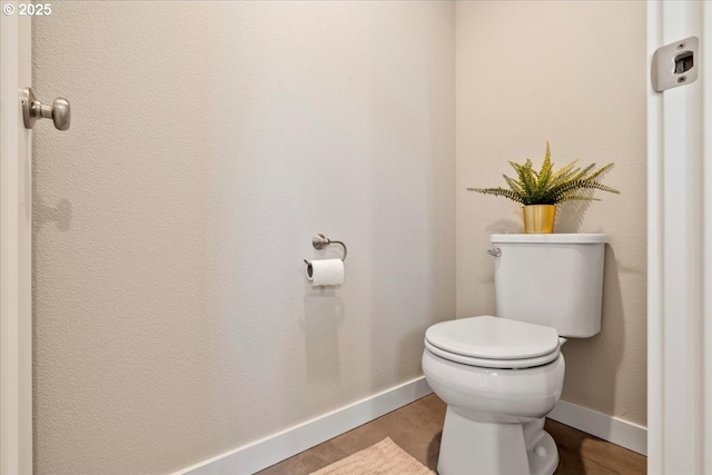 bathroom featuring toilet