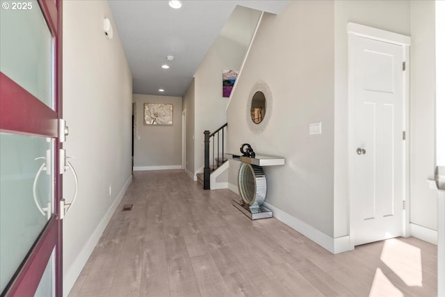 hall featuring light hardwood / wood-style floors