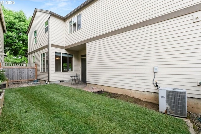 16044 SW Langer Dr, Sherwood, OR 97140 - back of property with central AC unit and a patio area