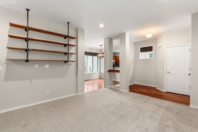 16044 SW Langer Dr, Sherwood, OR 97140 - empty room featuring carpet floors, baseboards, recessed lighting, and a chandelier