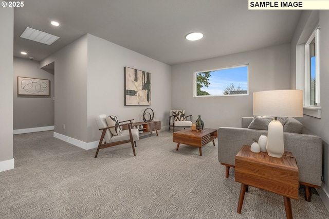 living area featuring recessed lighting, baseboards, and carpet floors