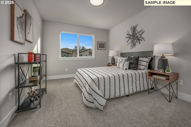 carpeted bedroom with baseboards