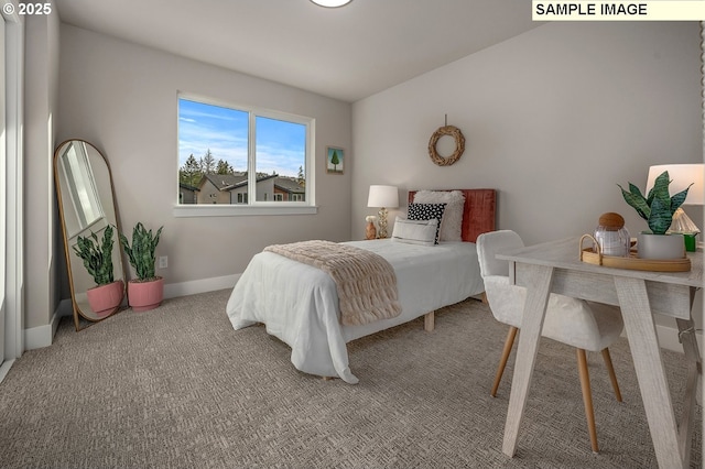 bedroom featuring baseboards and carpet flooring