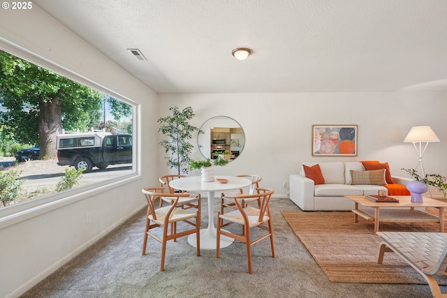 4433 NE 65th Ave, Portland, OR 97218 - dining area with light carpet and baseboards