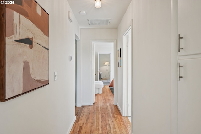 4433 NE 65th Ave, Portland, OR 97218 - hallway featuring light wood-type flooring and baseboards