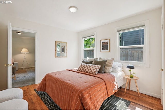 4433 NE 65th Ave, Portland, OR 97218 - bedroom featuring wood finished floors and baseboards