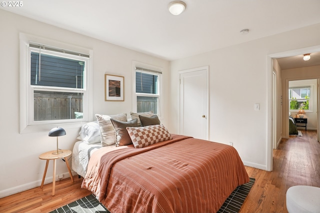 4433 NE 65th Ave, Portland, OR 97218 - bedroom featuring light wood-style flooring
