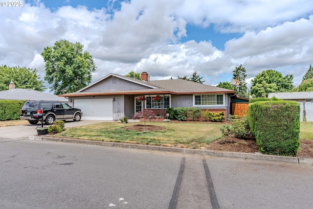 1445 NE 17th St, Gresham, OR 97030 - single story home featuring an attached garage, concrete driveway, and a chimney